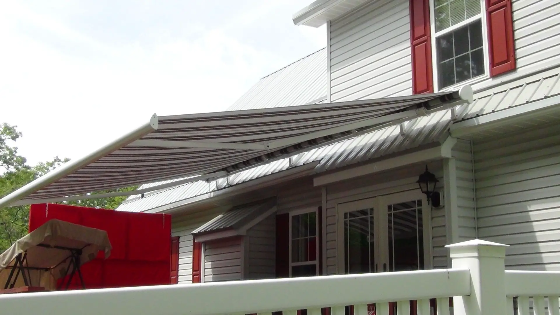 Great shade..metal roof retractable awning installation ...
