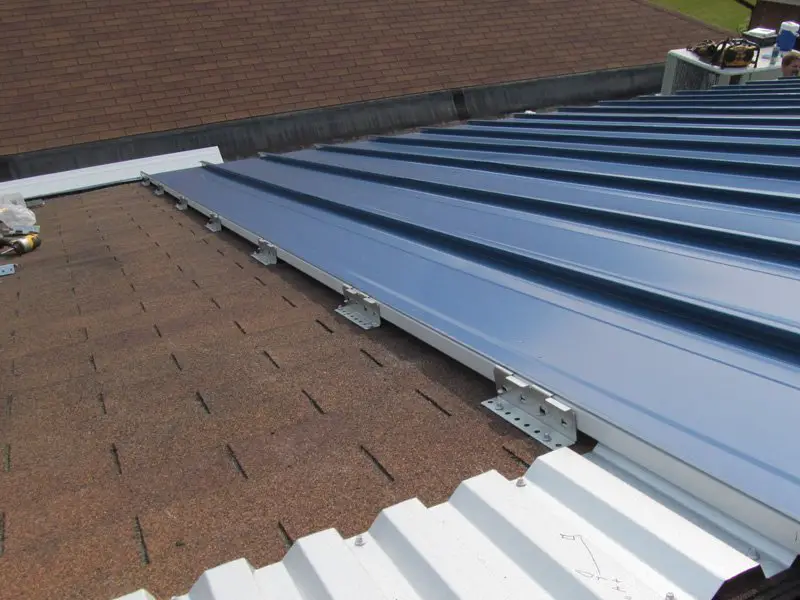 How to Install Metal Roofing Over Shingles or an Existing ...