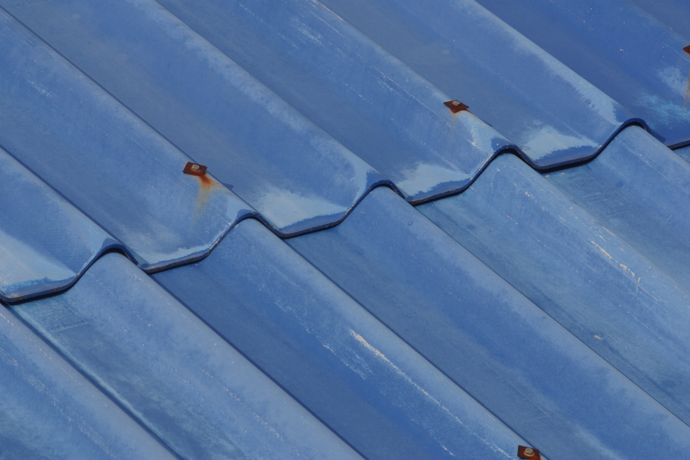 How to Paint a Galvanized Metal Roof With Sherwin