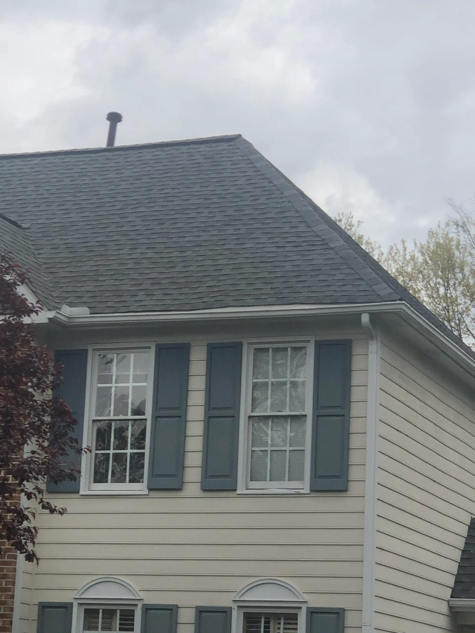 Is this wave just shingles too low on the fascia? Roofer ...