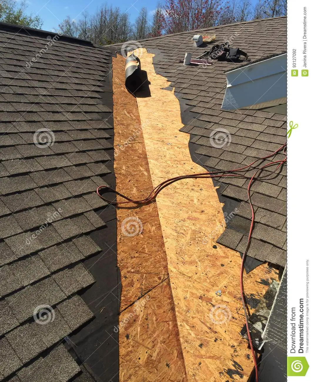 Roof Leak Repairs on Valley of Residential Shingle Roof in Process ...