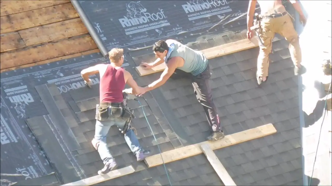 Roofers Without Safety Harnesses