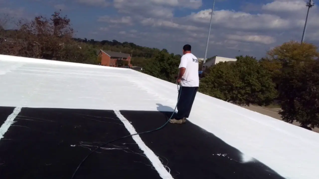 Silicone roof coating on EPDM