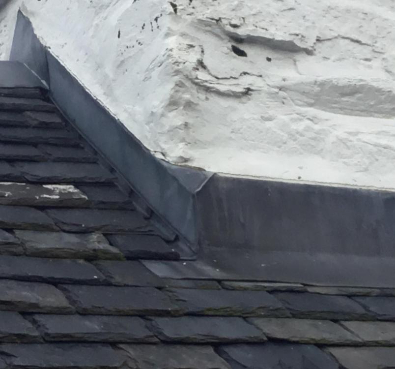 Slate Roof to Render Board Covered Gable End