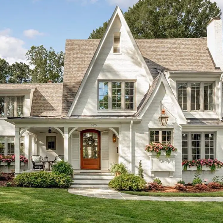 This cottage style home has ultimate curb appeal! The roof peeks, front ...