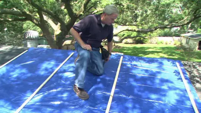 Use A Tarp To Temporarily Stop Roof Leaks