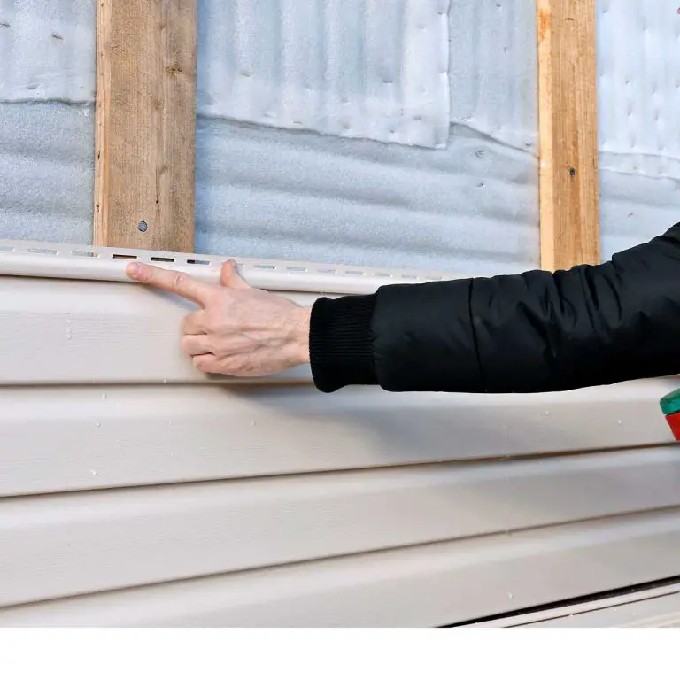 Why does siding buckle? :: Village Roofing &  Construction